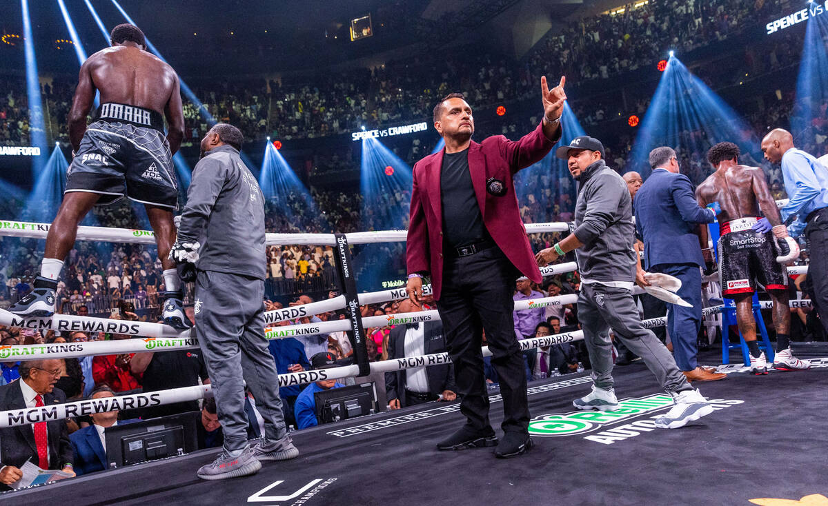 Terence Crawford celebrates his win over Errol Spence Jr., in round 9 during an undisputed wor ...