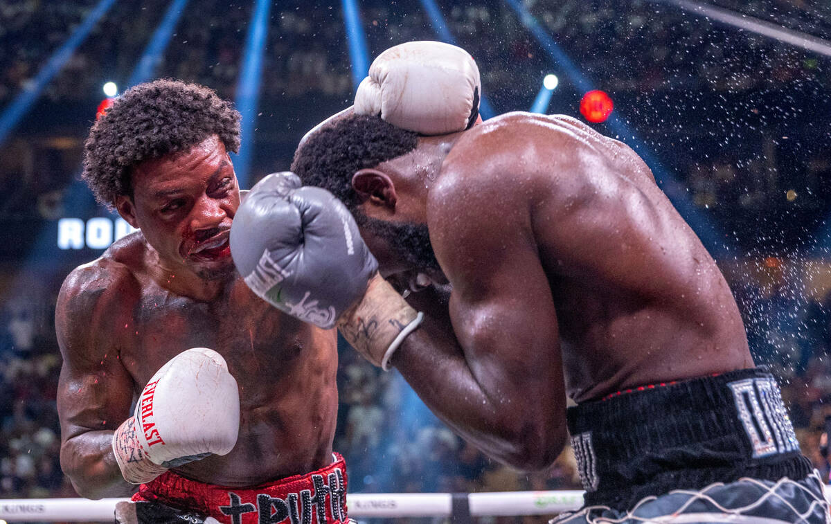 Errol Spence Jr., catches a glancing blow on Terence Crawford in round 8 during an undisputed w ...