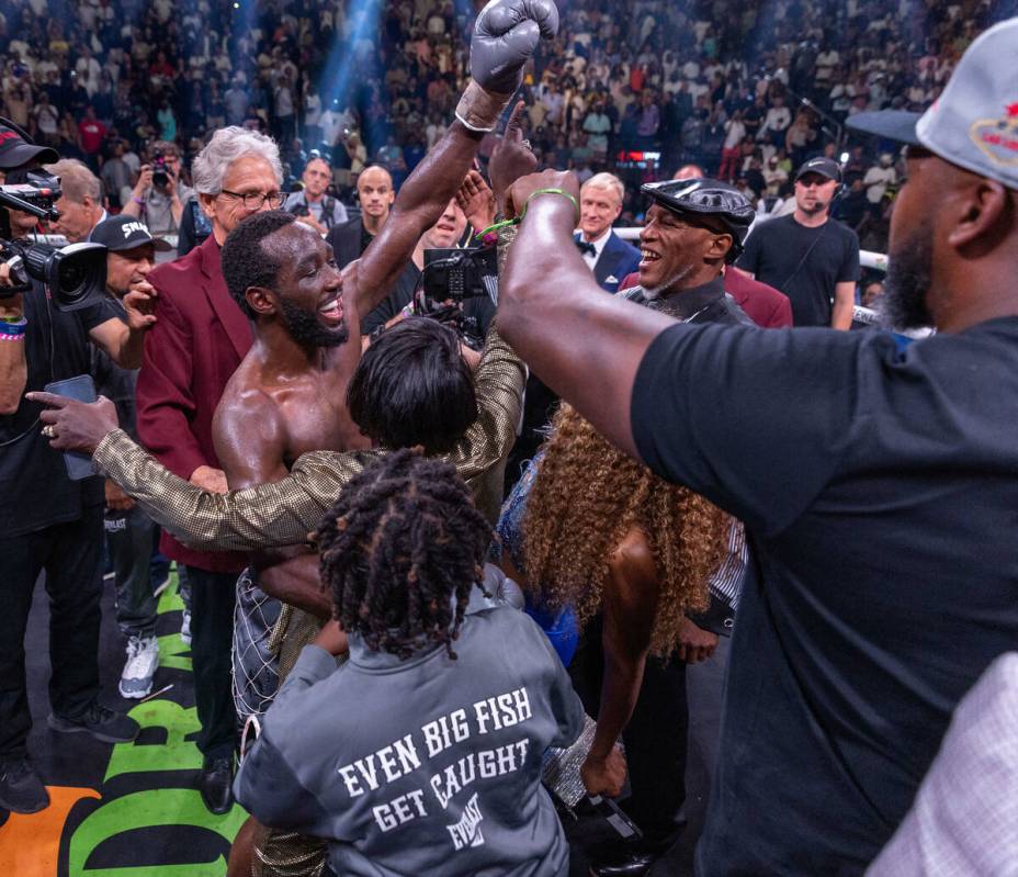 Terence Crawford celebrates his win with his family over Errol Spence Jr., ended in round 9 dur ...