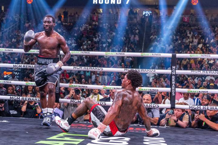 Terence Crawford knocks Errol Spence Jr., down for the second time in round 7 during an undispu ...