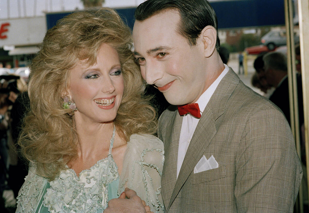 Actress Morgan Fairchild and funny man Pee-Wee Herman (Paul Reubens) pose for photographers as ...