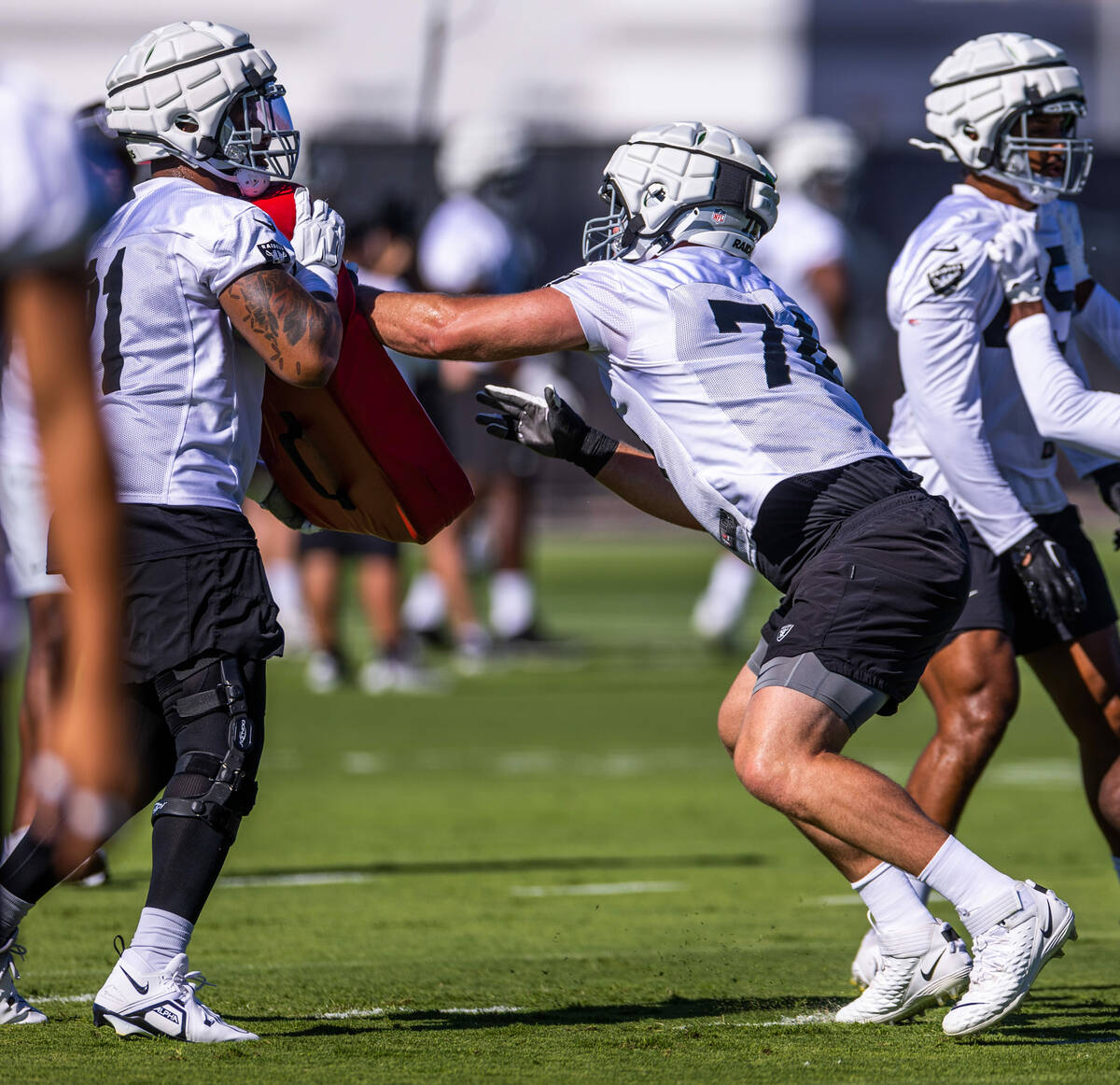 Raiders tackle Kolton Miller (74) blocks a teammate during training camp at the Intermountain H ...