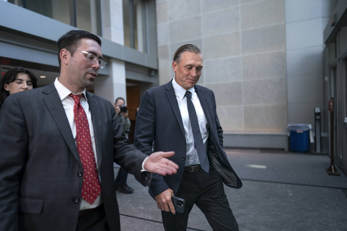 Devon Archer, Hunter Biden's former business partner, joined at left by lawyer Matthew Schwartz ...