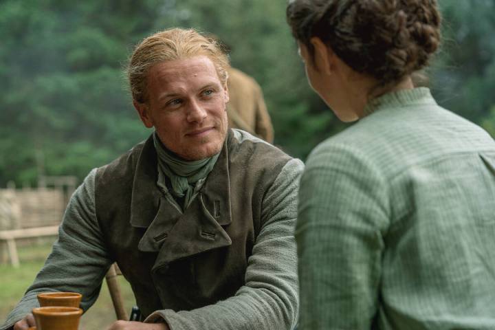 Sam Heughan as Jamie Fraser with Caitríona Balfe as Claire Fraser in scene from Season 7 of "O ...