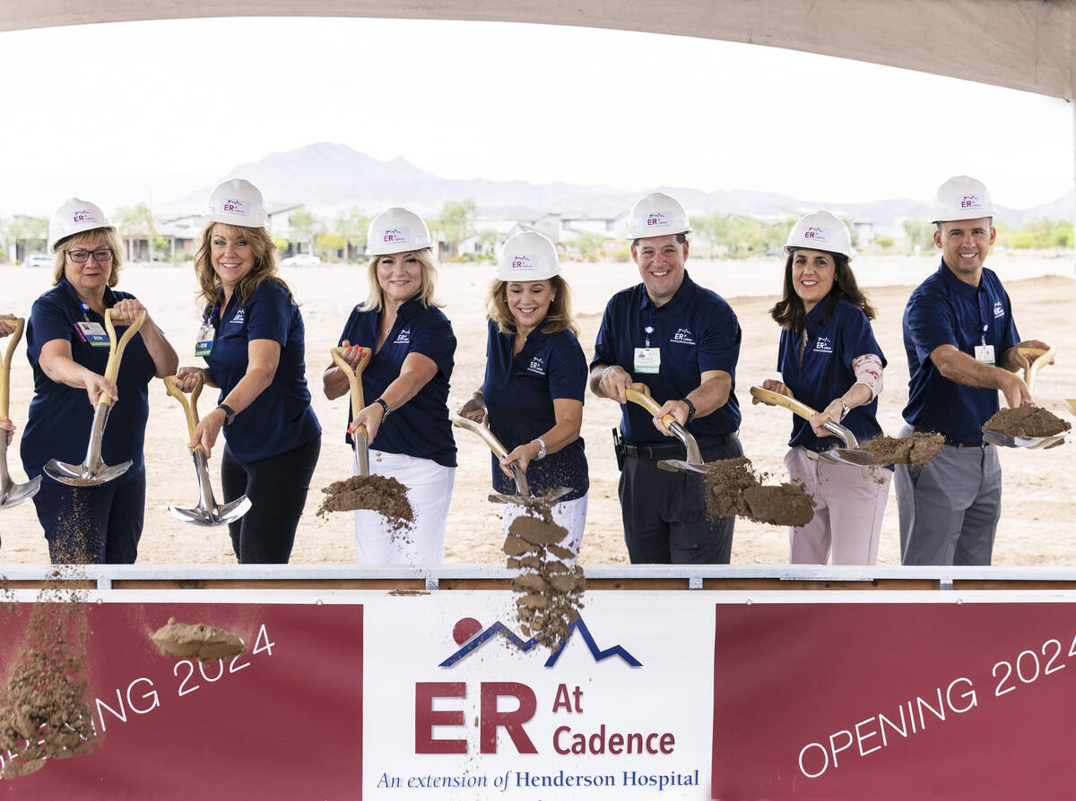 City of Henderson Mayor Michelle Romero, third left, Sam Kaufman, CEO of Henderson Hospital, an ...