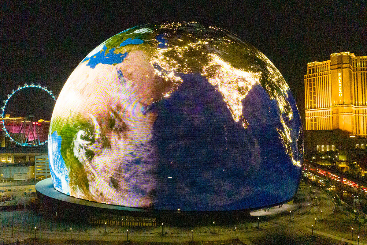 The Sphere illuminates the Las Vegas skyline, on Monday, July 31, 2023, in Las Vegas. (Bizuayeh ...