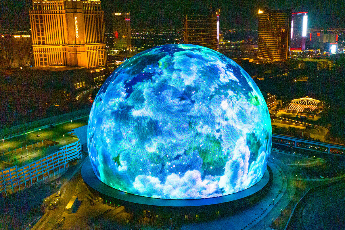 The Sphere illuminates the Las Vegas skyline, on Monday, July 31, 2023, in Las Vegas. (Bizuayeh ...