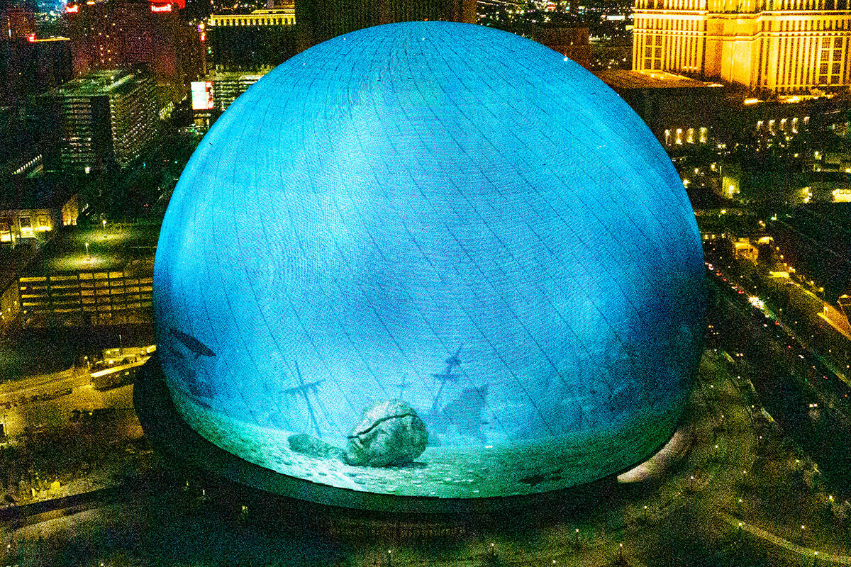 The Sphere illuminates the Las Vegas skyline, on Monday, July 31, 2023, in Las Vegas. (Bizuayeh ...