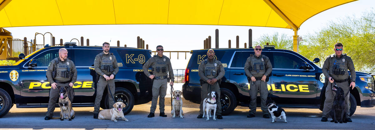 Clark County School District Police Department's K-9 unit officers with their dogs gather for p ...