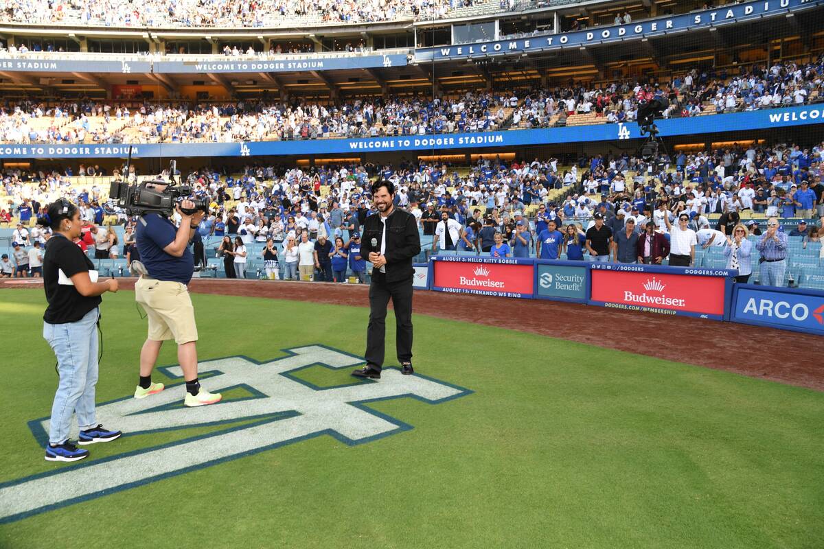 Vegas showman Frankie Moreno sings the national anthem at the L.A. Dodgers-Cincinnati Reds game ...