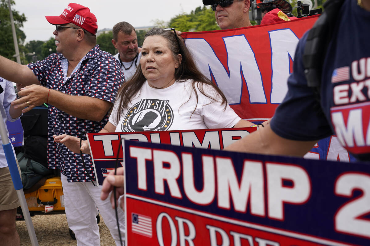 Supporters of Former President Donald Trump gather at the E. Barrett Prettyman U.S. Federal Cou ...