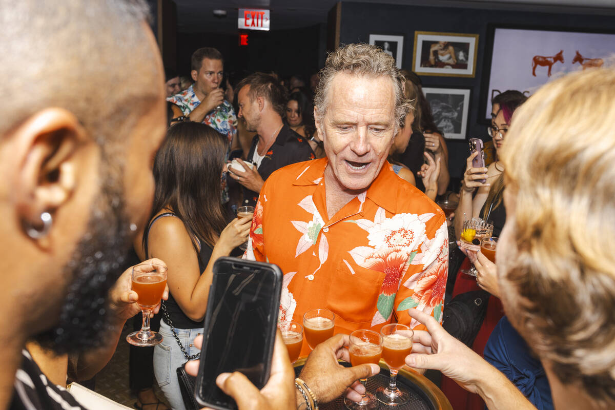 Bryan Cranston of "Breaking Bad" serves Dos Hombres Mezcal cocktails at Ocean Prime Las Vegas o ...