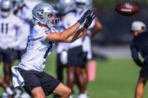 Raiders wide receiver Hunter Renfrow (13) catches a pass during training camp at the Intermoun ...