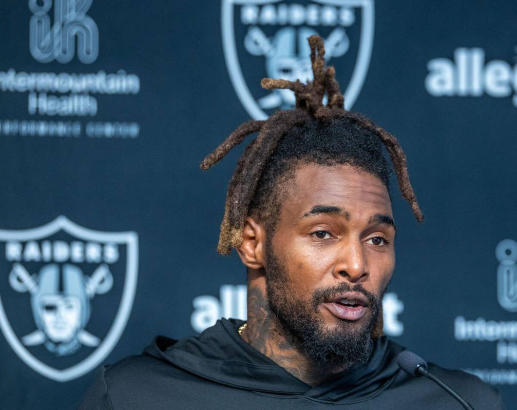 Raiders running back Brandon Bolden (34) answers a question during a press conference in traini ...