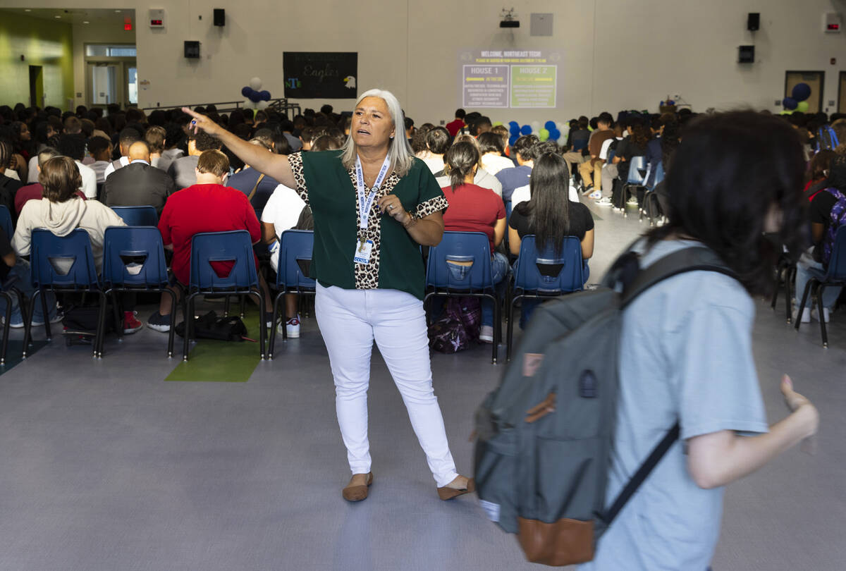 Angelique Stoker, a teacher at Northeast Career and Technical Academy, directs students during ...