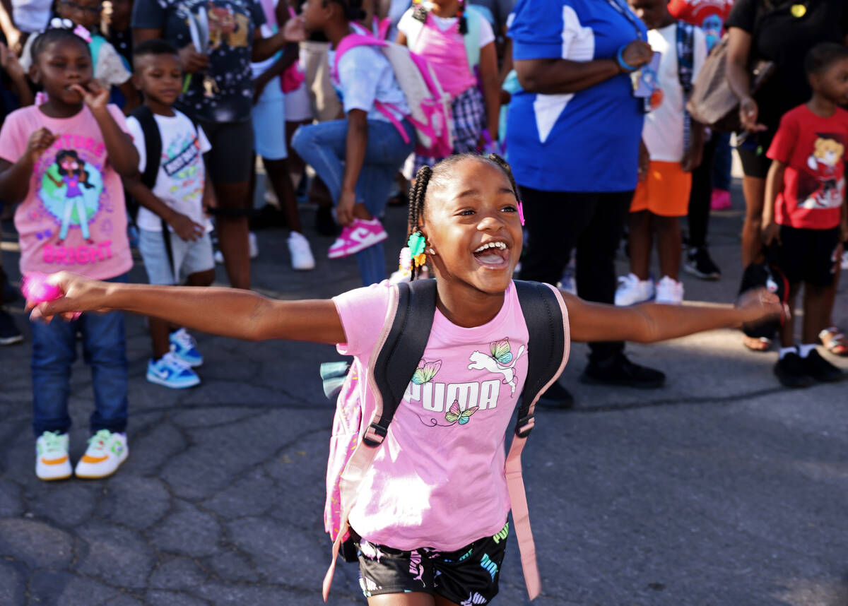Second grader Janiya Doebine sees her teacher during the annual “Welcome Back to School& ...