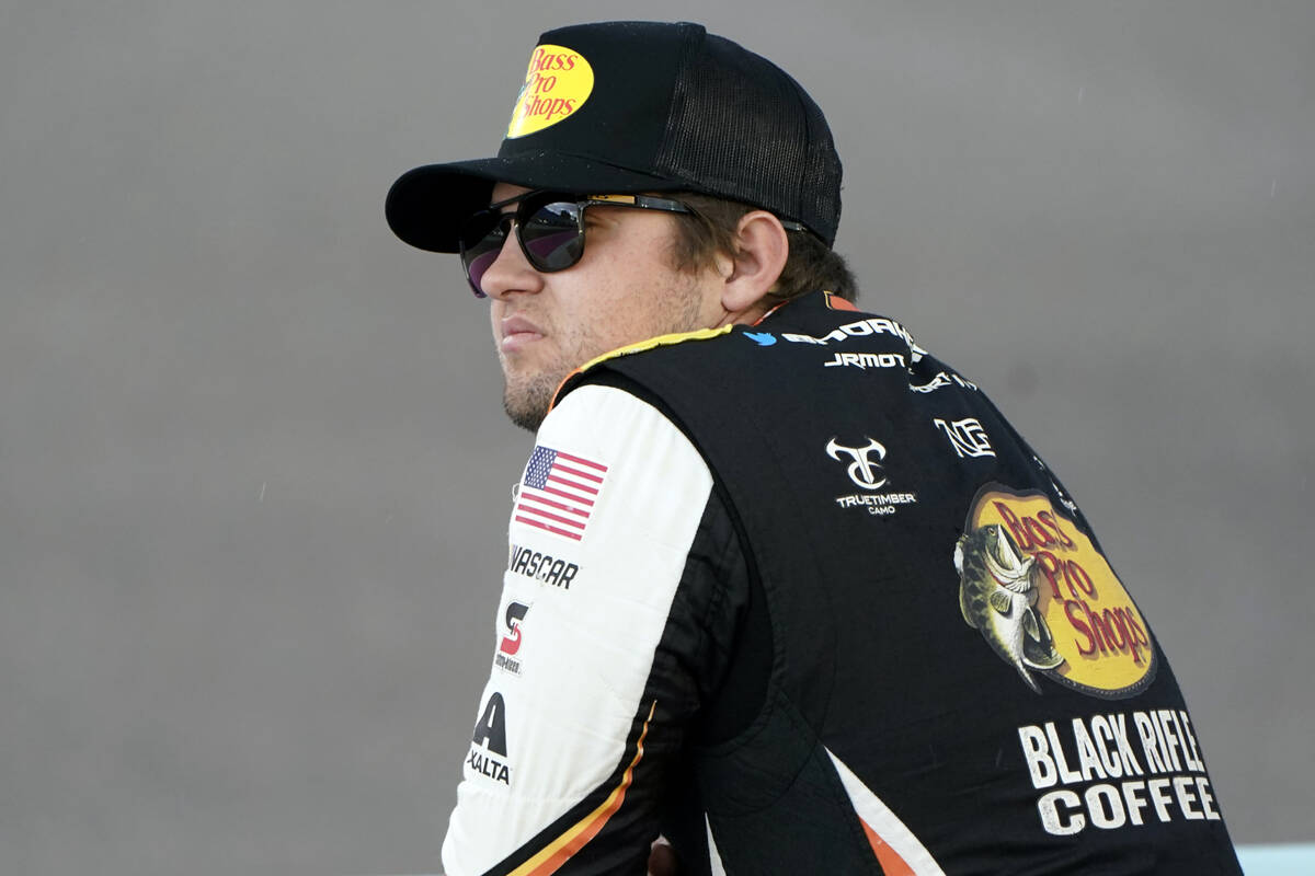 FILE - Noah Gragson looks out onto the track before a NASCAR Xfinity Series auto racing practic ...