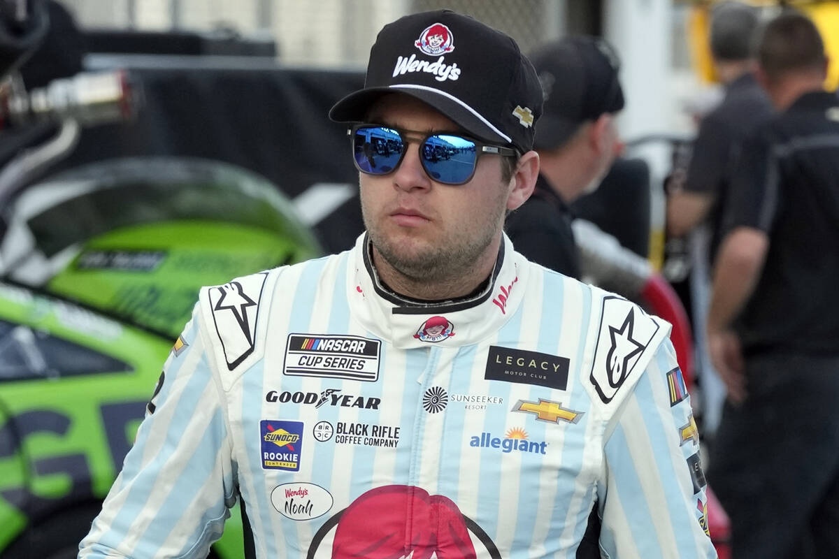 FILE - Noah Gragson walks to his garage during a practice session for the NASCAR Daytona 500 a ...