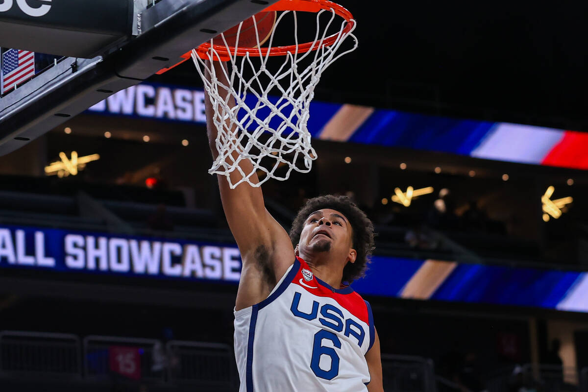 USA Basketball Men’s National Team forward Cam Johnson (6) makes a layup at the first ex ...