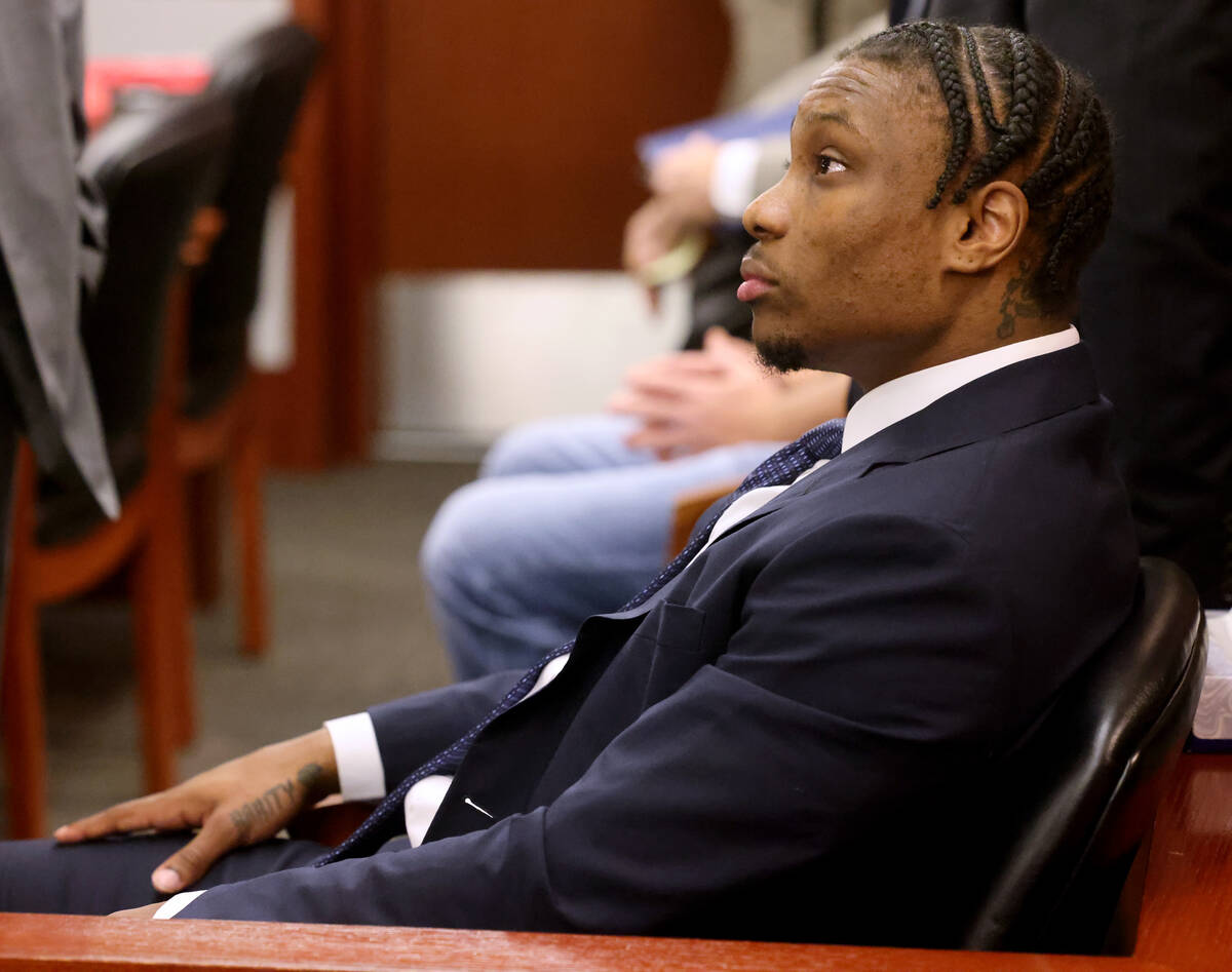 Former Raiders wide receiver Henry Ruggs waits in court at the Regional Justice Center in Las V ...