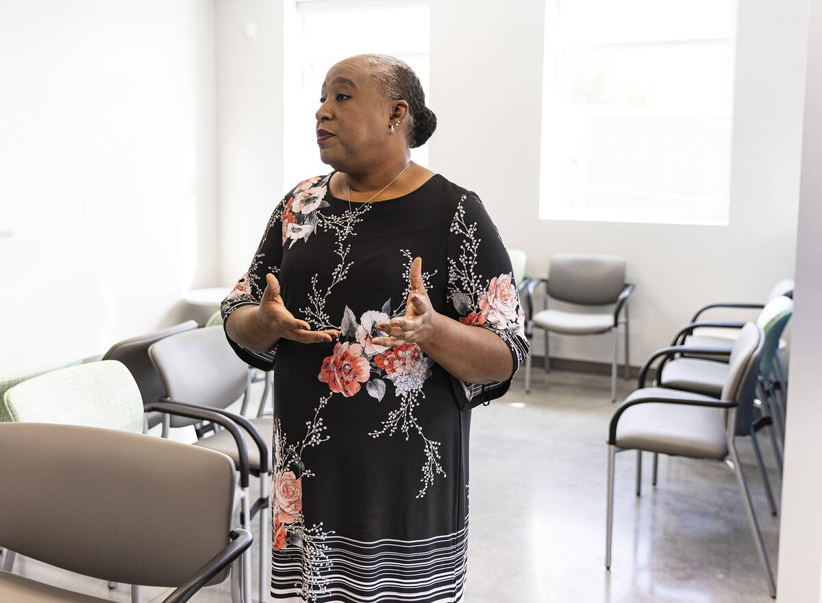 Jocelyn Bluitt-Fisher, community resource manager, leads a tour of Las Vegas Health and Wellnes ...