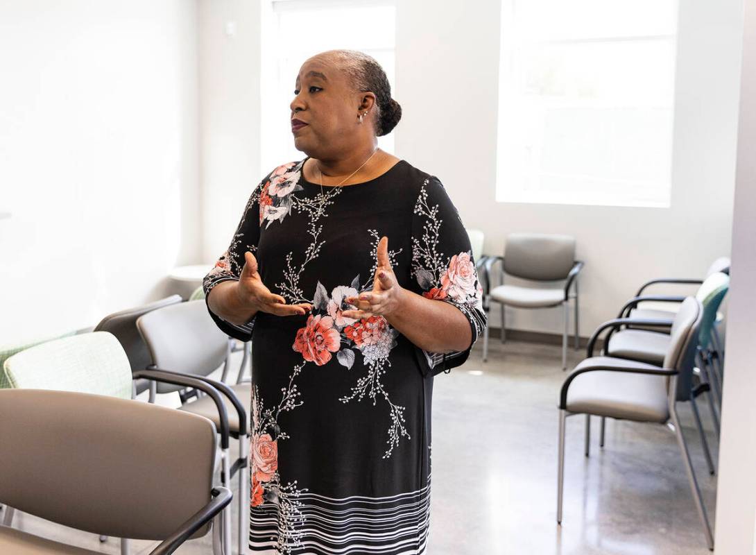 Jocelyn Bluitt-Fisher, community resource manager, leads a tour of Las Vegas Health and Wellnes ...