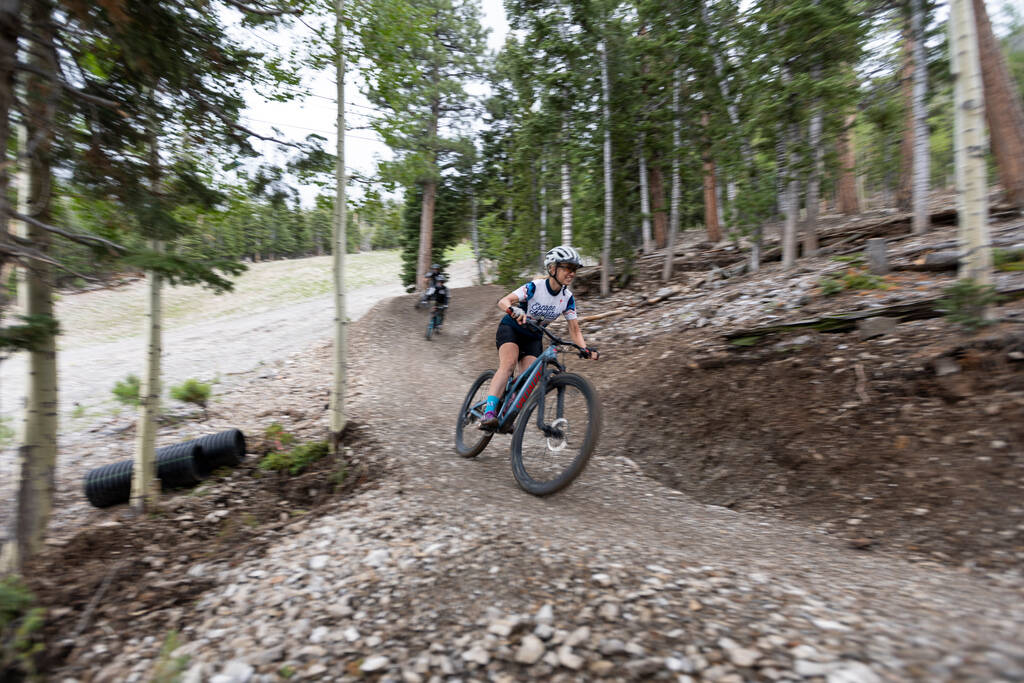 Heather Fisher, president of Save Red Rock and Las Vegas Cyclery, rides down a downhill mountai ...