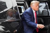 FILE - Former President Donald Trump arrives to board his plane at Ronald Reagan Washington Nat ...