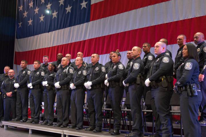 The graduating class of officers for the North Las Vegas Police and the CCSD Police pose with t ...