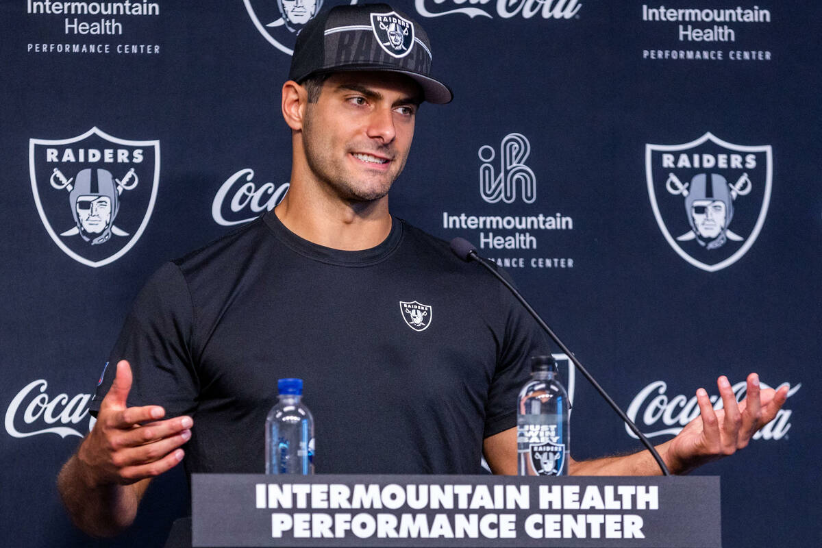 Raiders quarterback Jimmy Garoppolo (10) answers a question during a press conference in traini ...