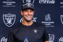 Raiders quarterback Jimmy Garoppolo (10) laughs at a question during a press conference in trai ...