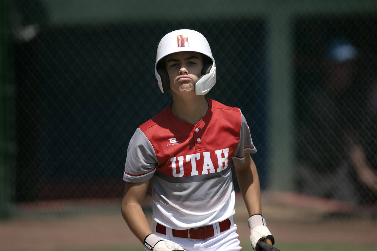 Utah pitcher Brogan Coop (8) reacts after Henderson pitcher Nolan Gifford (22) struck him out d ...