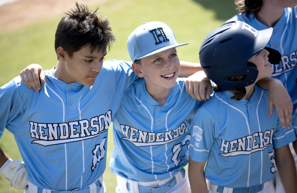 Henderson short stop David Edwards, left, left fielder Mason Walther and right fielder Cruz Les ...