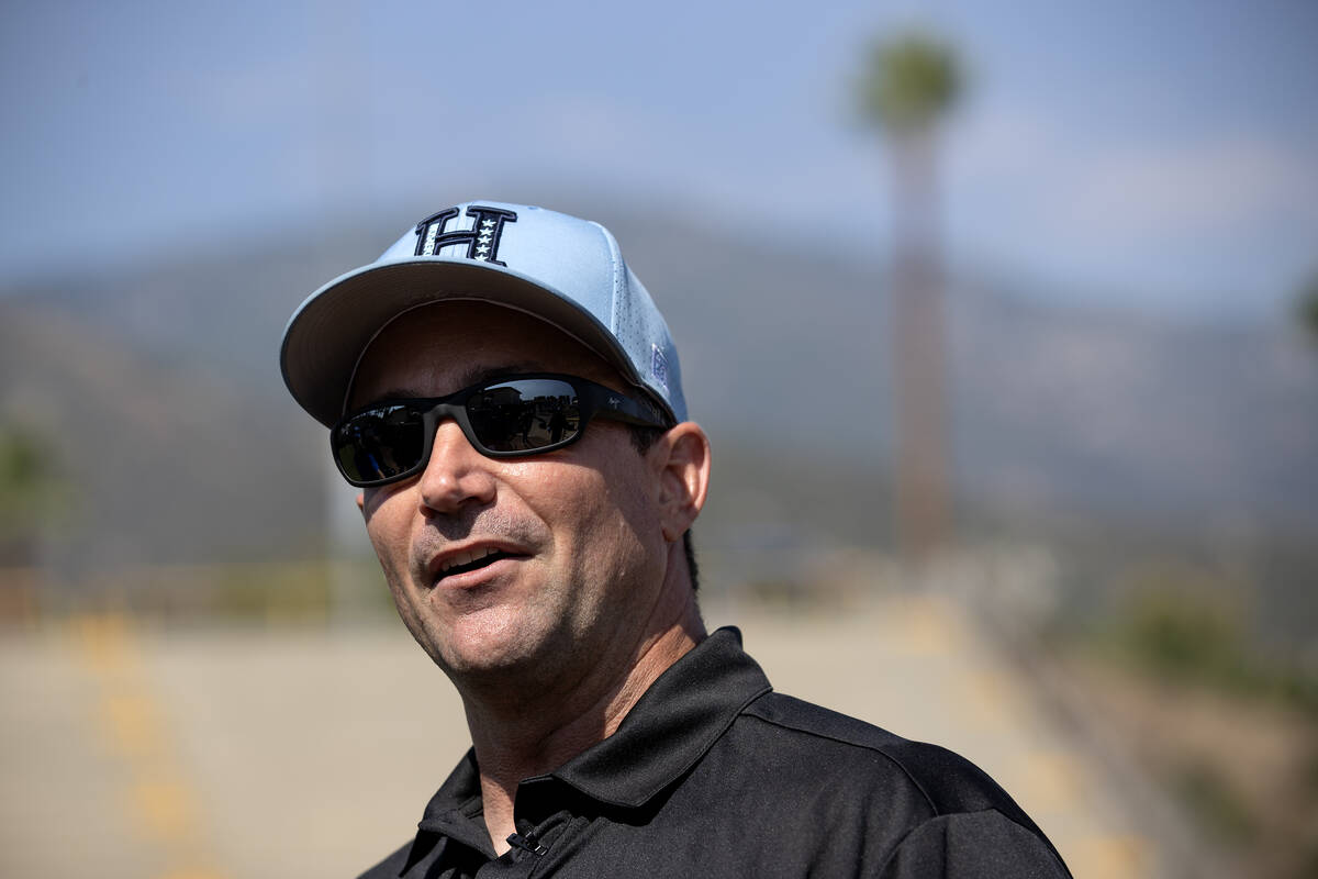 Henderson team manager Ryan Gifford speaks to the press after his team won the Little League We ...