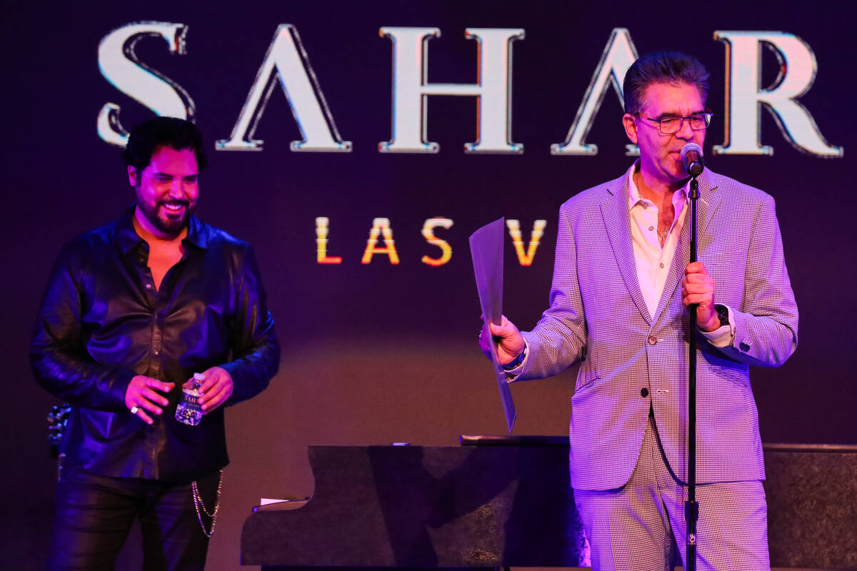 John Katsilometes presents a proclamation issued by the mayor of Las Vegas to Frankie Moreno in ...