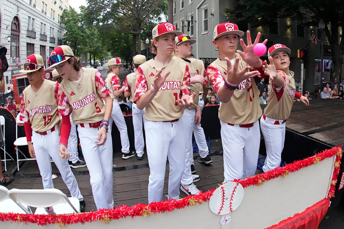 The Mountain Region champion Little League team from Henderson, Nevada, rides in the Little Lea ...