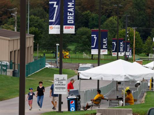 Fans arrive at Howard J. Lamade Stadium where the Little League World Series will be held, on T ...