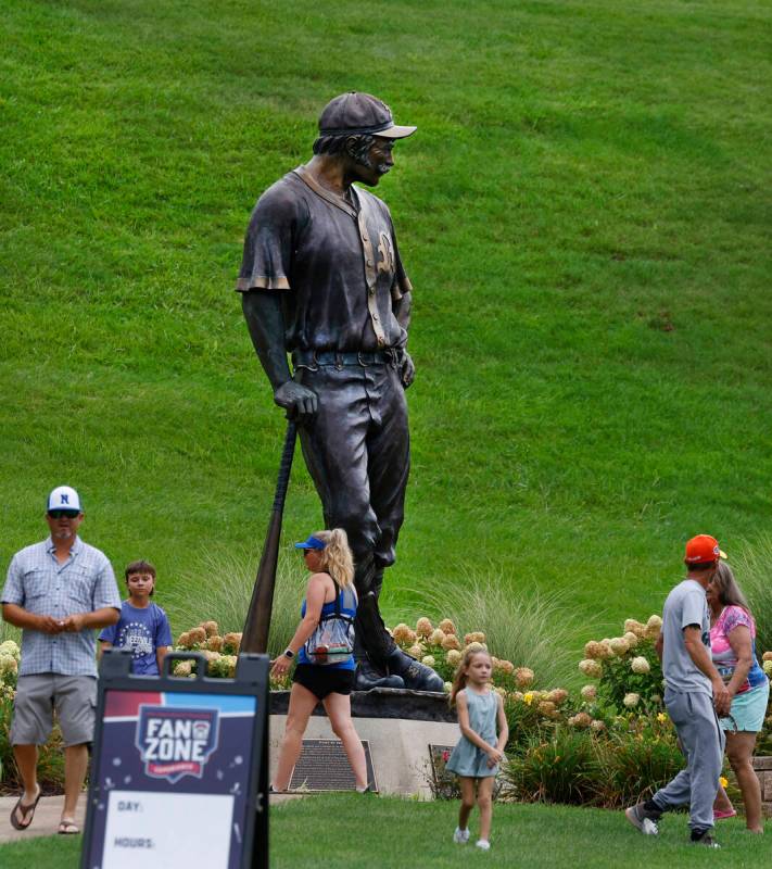 Fans walk past the Casey at the Bat Statue at Howard J. Lamade Stadium where the Little League ...