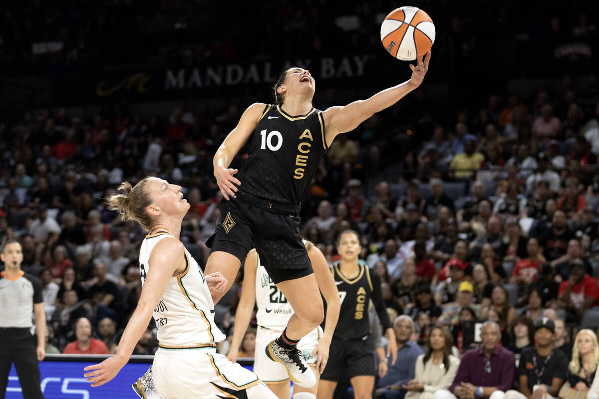 Las Vegas Aces guard Kelsey Plum (10) shoots against New York Liberty guard Courtney Vandersloo ...