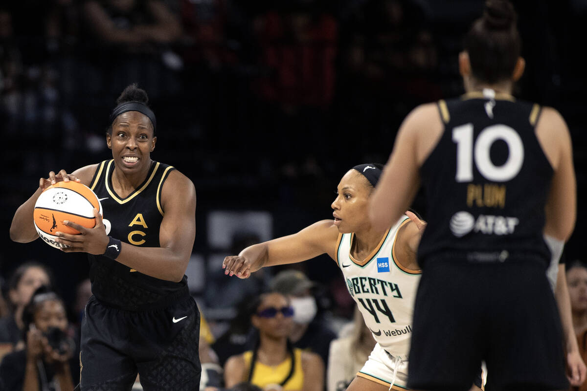 Las Vegas Aces guard Chelsea Gray (12) struggles to communicate with guard Kelsey Plum (10) whi ...