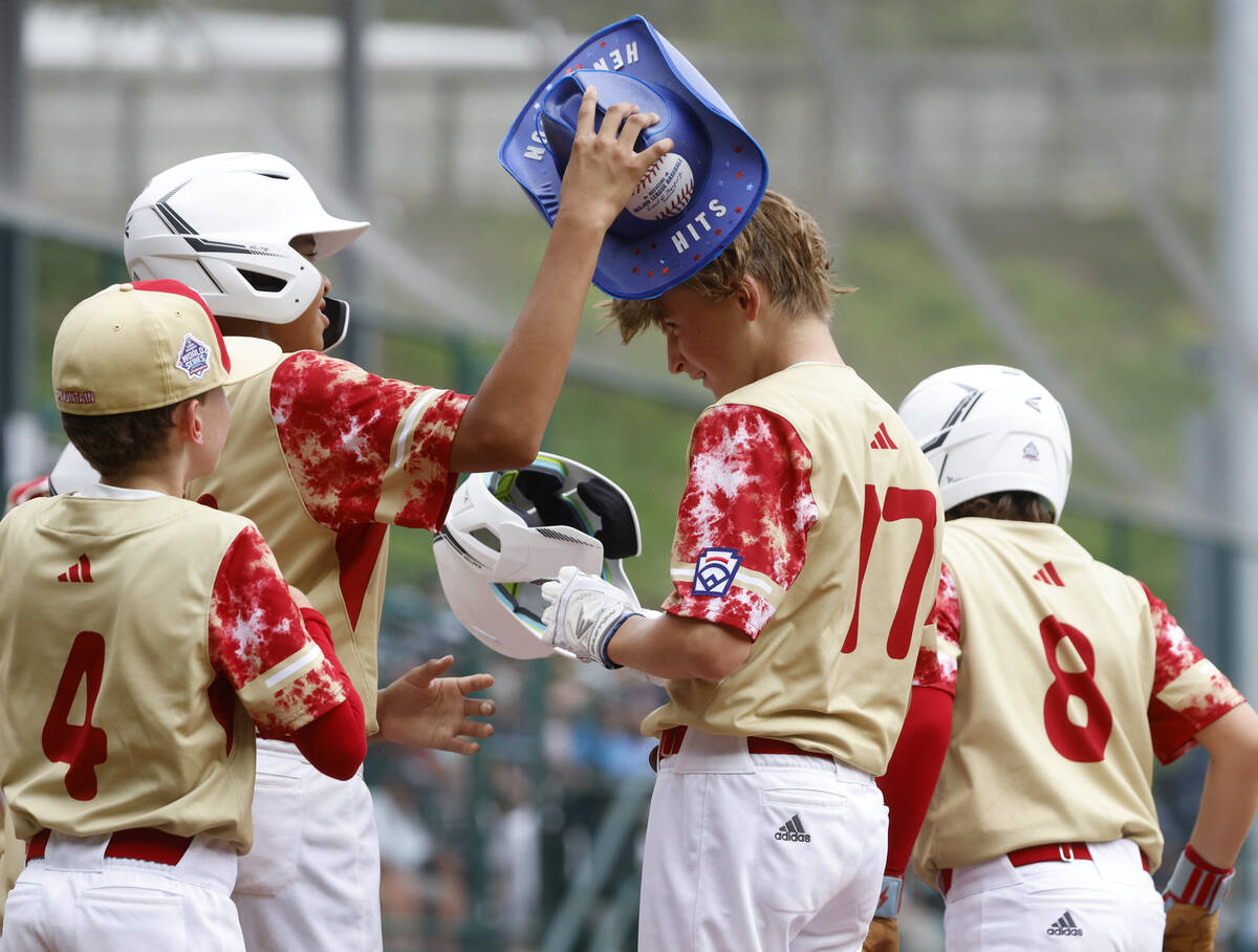 The "Henderson Hit" blue hat was placed on Henderson All-Stars centerfielder Jaxson M ...