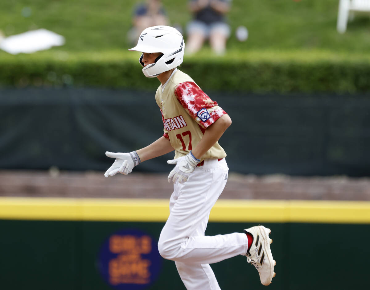 The Henderson All-Stars centerfielder Jaxson McMullen runs bases after hitting a homer against ...