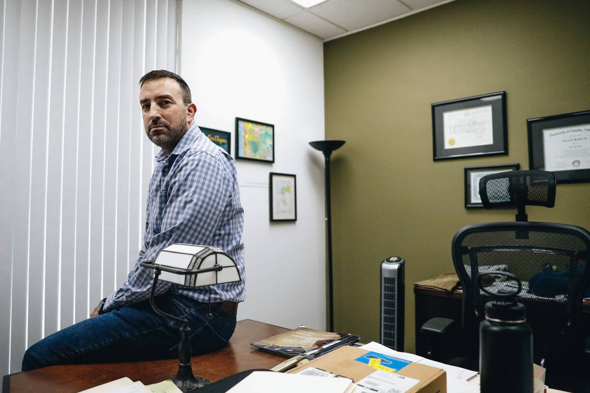 Joseph Maridon, an attorney who specializes in traffic violations, poses for a portrait at his ...