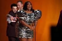 Lizzo accepts the award for record of the year for "About Damn Time" at the 65th annu ...