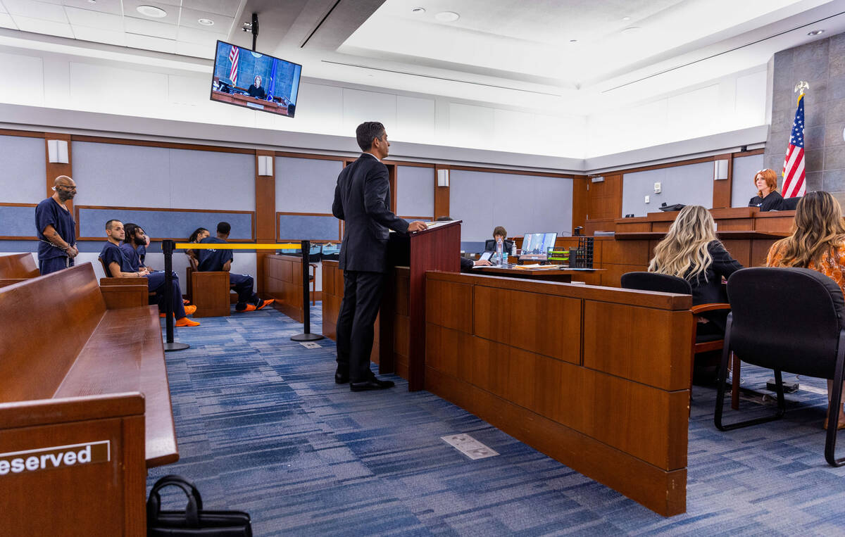 James Gina, left, stands as his lawyer, Richard Tanasi, speaks to Justice of the Peace Amy Wils ...