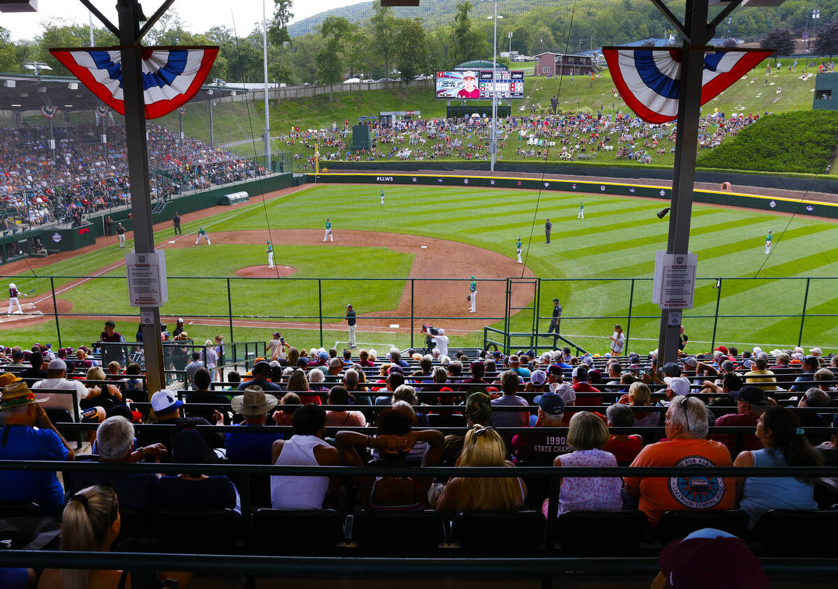 Fans watch a baseball game at Howard J. Lamade Stadium during the Little League World Series to ...