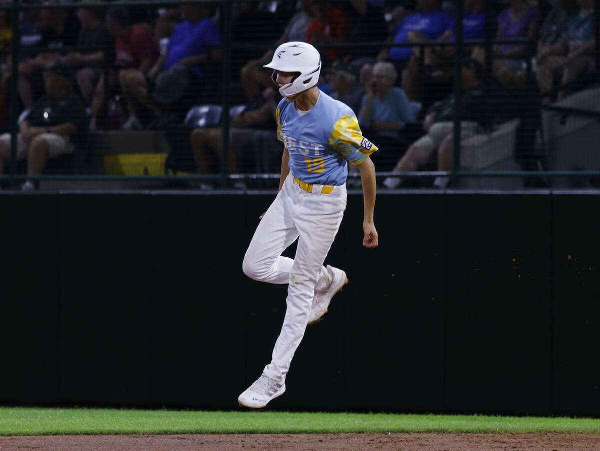 El Segundo California All-Stars first baseman Louis Lappe celebrates after hitting a homer agai ...