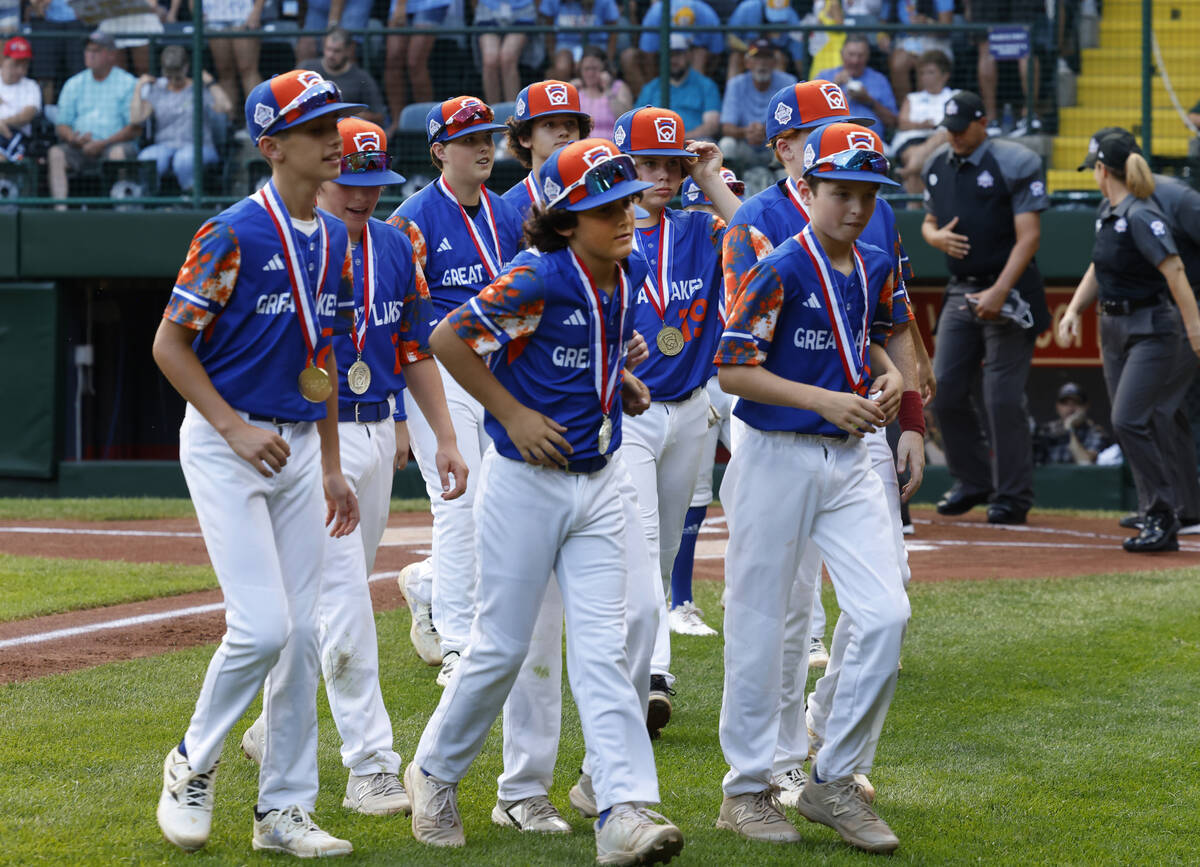 New Albany All-Stars players take the field to face El Segundo California All-Stars during the ...