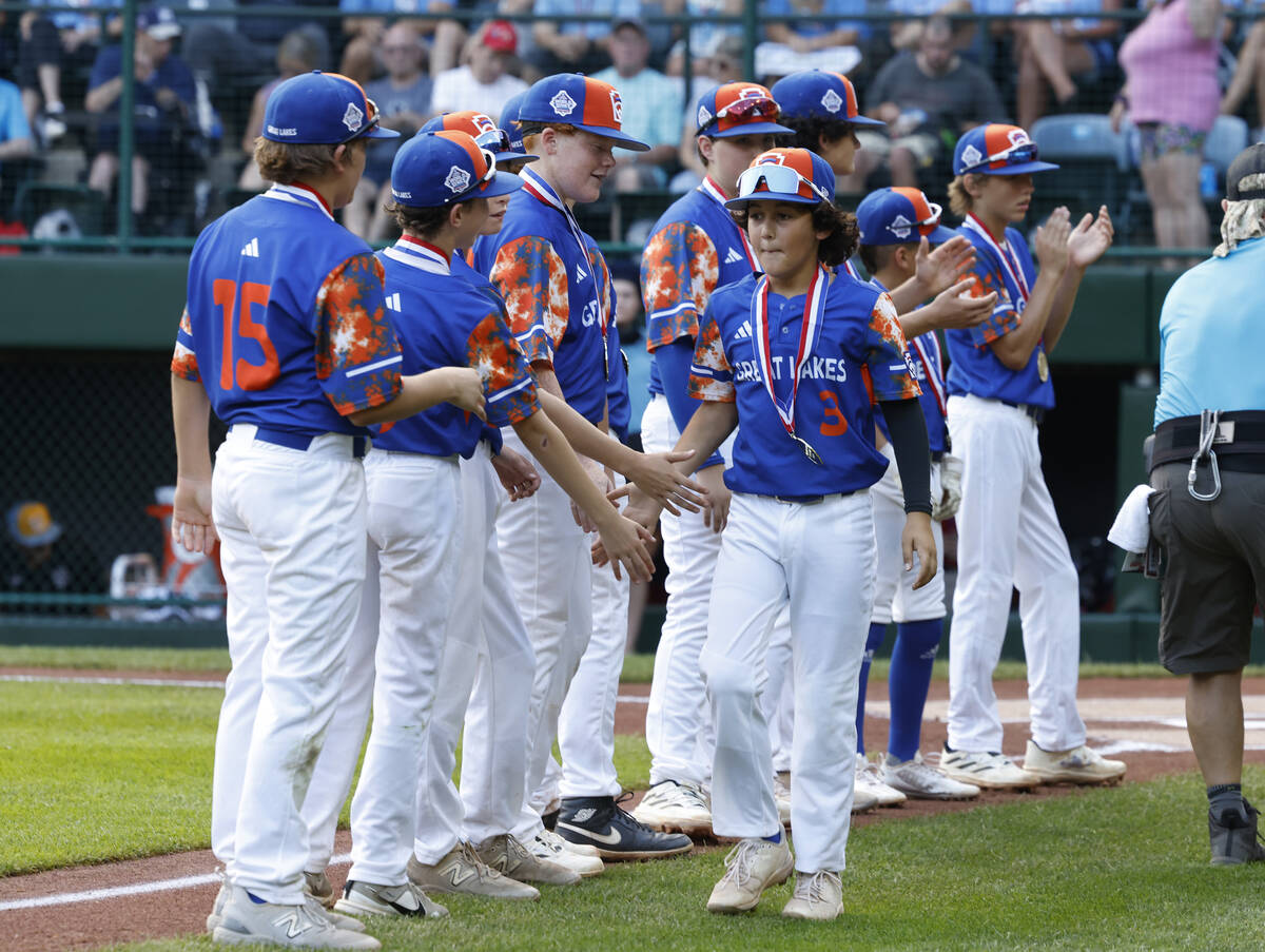 New Albany All-Stars players take the field to face El Segundo California All-Stars during the ...