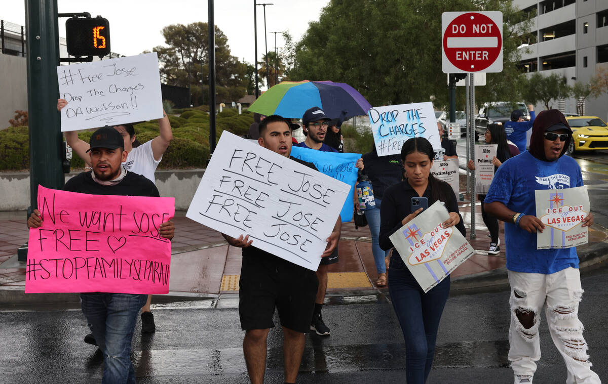 People rally outside the U.S. Immigration and Customs Enforcement offices in downtown Las Vegas ...